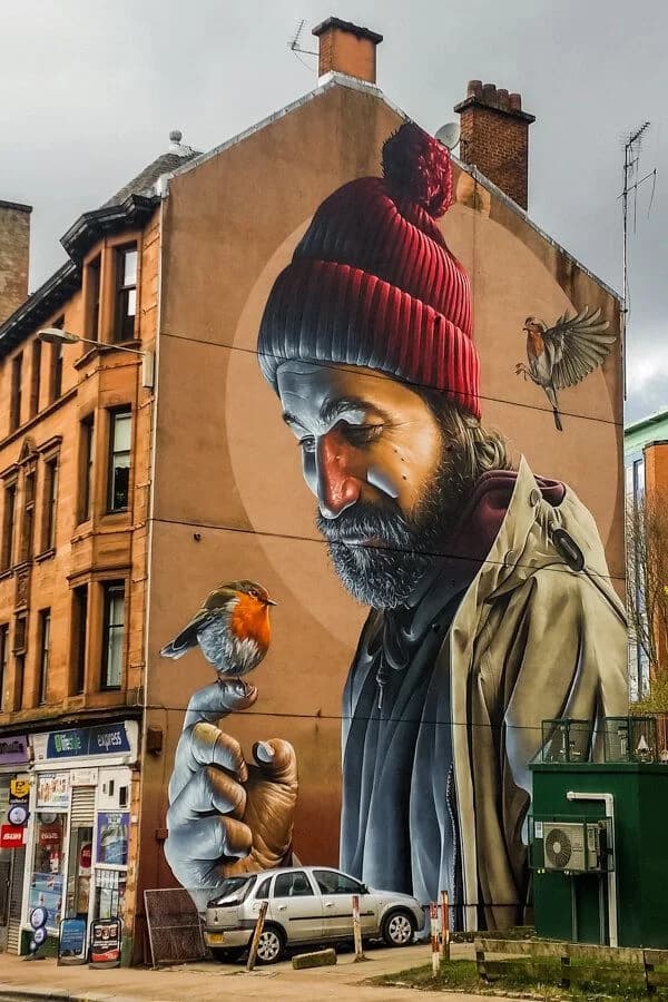 A spray-painted mural on a weathered wall