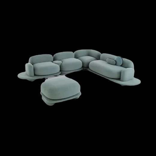 A teal modular sofa with rounded bolsters