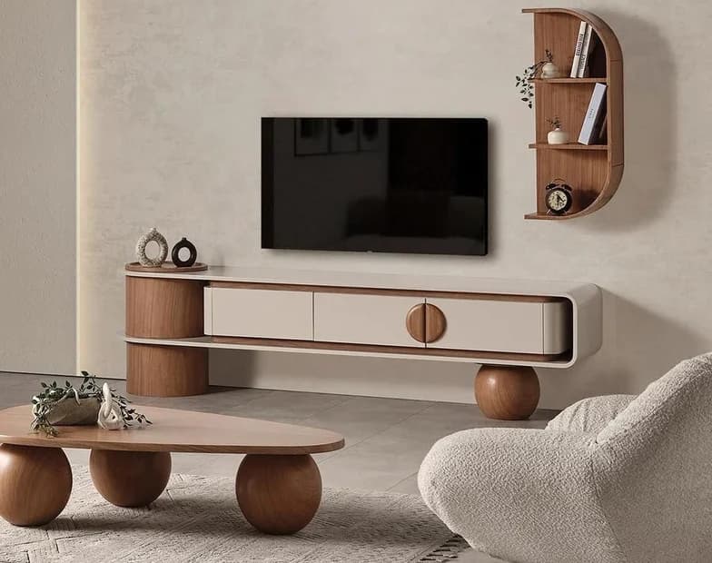 A wall-hung media console under a mounted screen