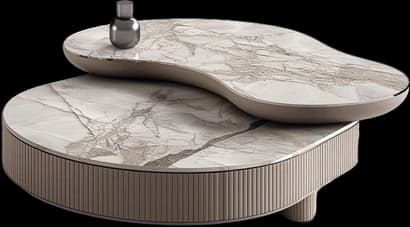 A shaped marble coffee table on a fluted plinth