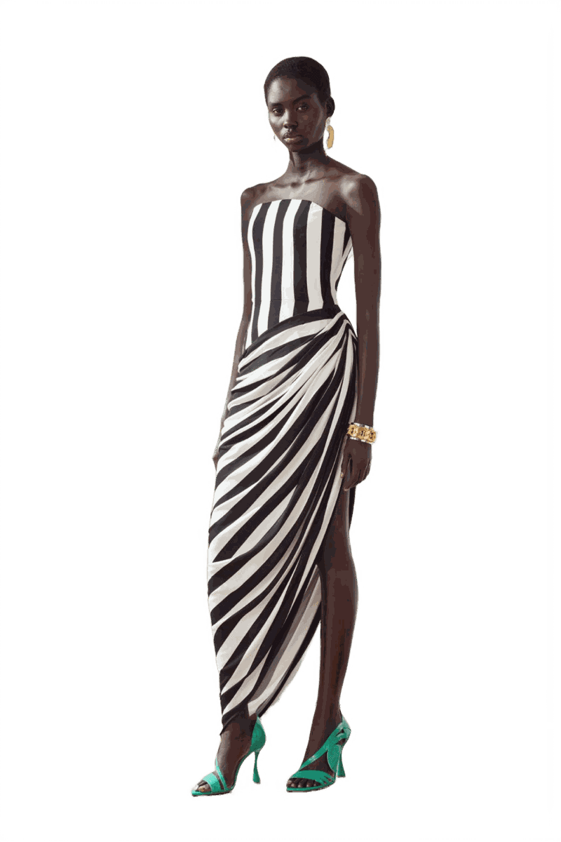 A black and white striped gown gathered at the hip