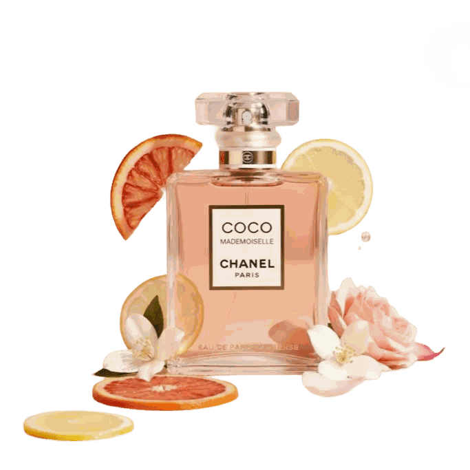 A perfume bottle among sliced citrus