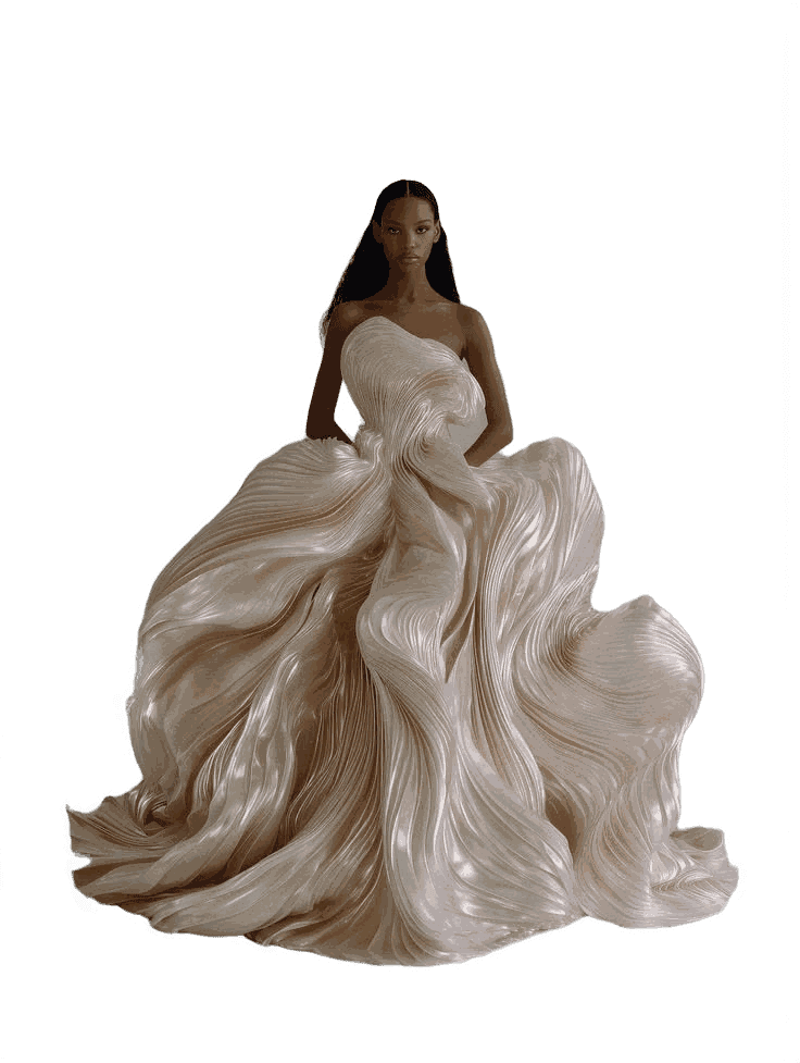 A pleated champagne gown with a sweeping train