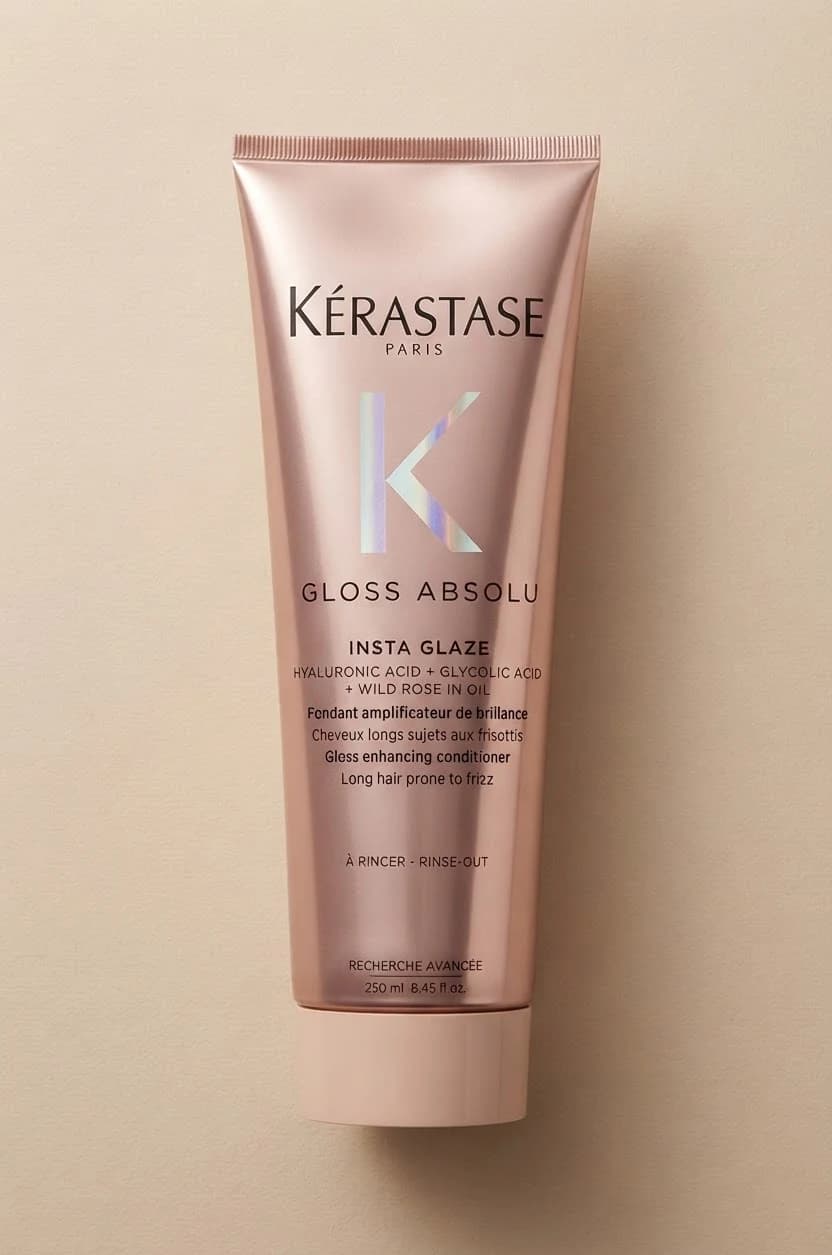 The Gloss Absolu tube laid on a sand-coloured ground