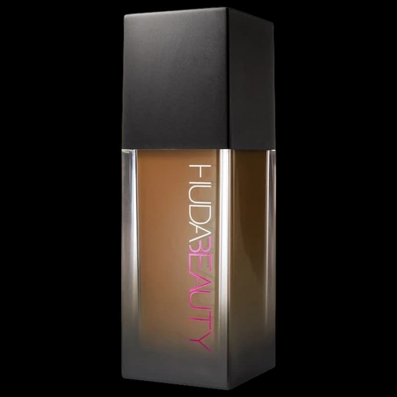A tall glass bottle of liquid foundation
