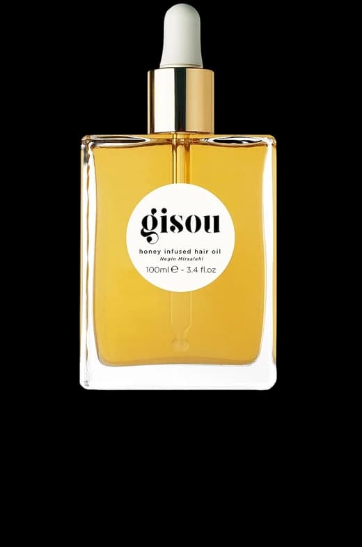A bottle of honey infused hair oil