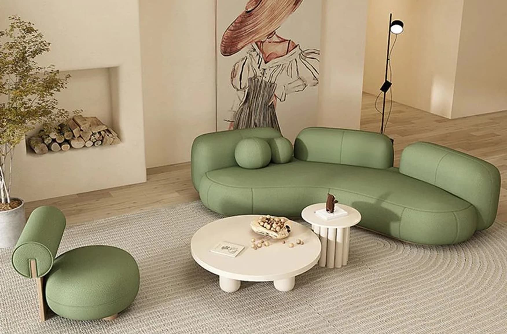 A sage bouclé sectional and pale plaster tables in a bright room