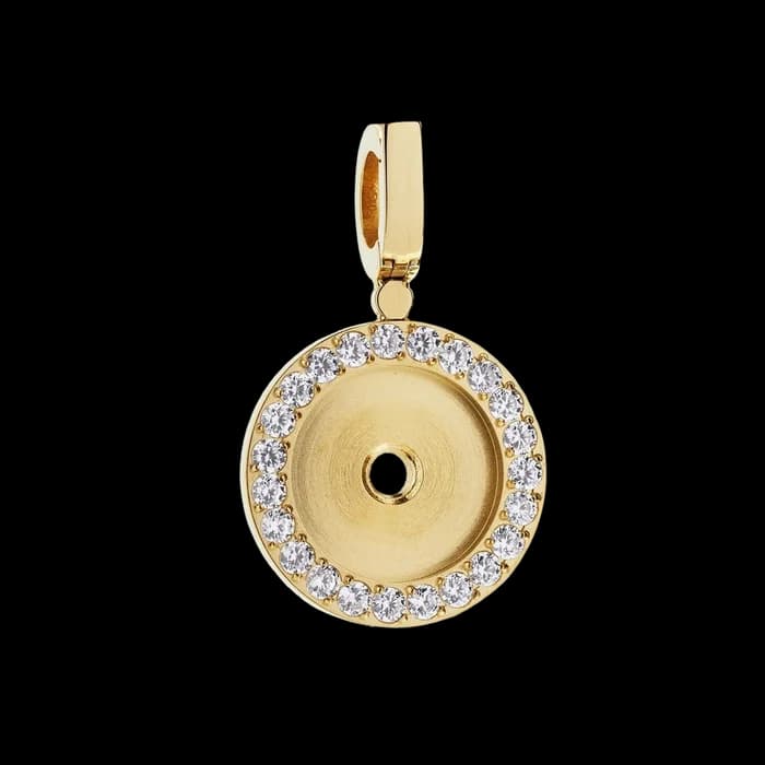 A round gold pendant edged in pavé diamonds