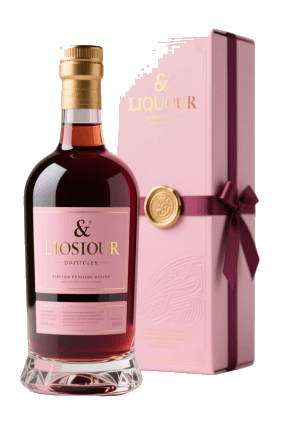 A rosé bottle beside a ribboned pink gift box