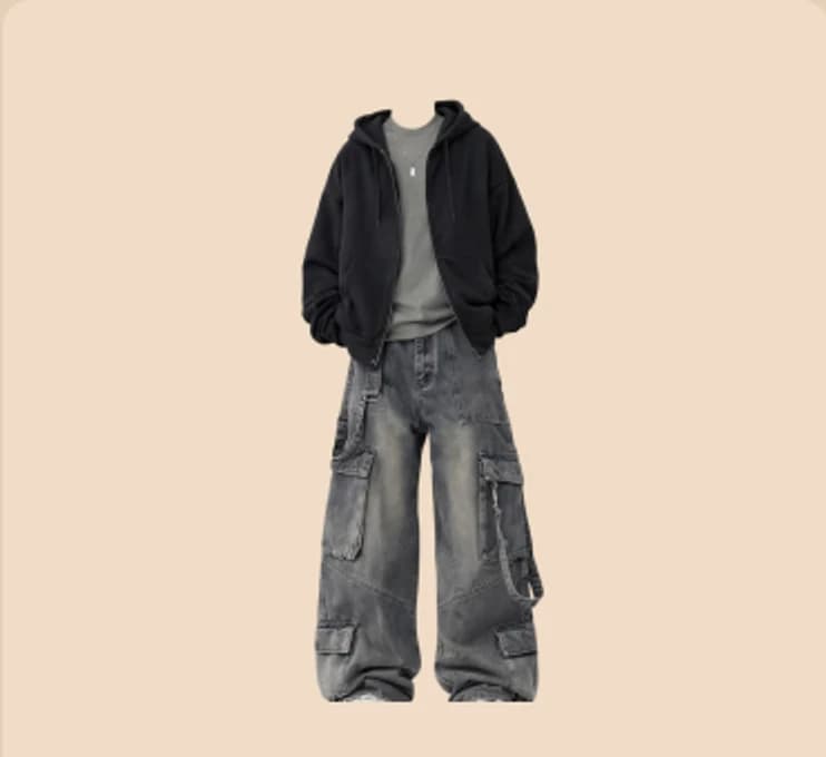 A black bomber jacket over loose denim