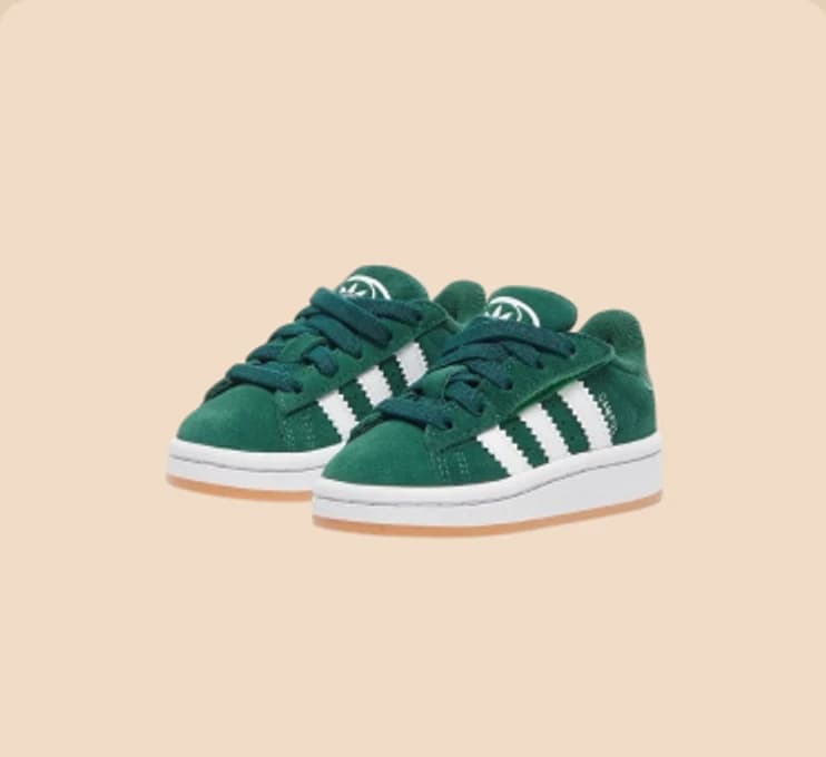 A pair of green suede trainers