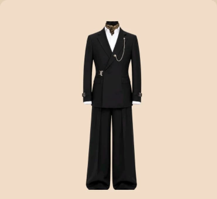 A black dinner jacket over wide trousers