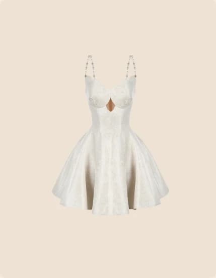A short ivory dress with a corseted bodice
