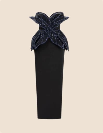 A black midi dress with navy petals at the shoulders
