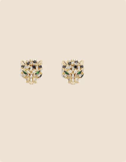 Gold panther stud earrings with green eyes