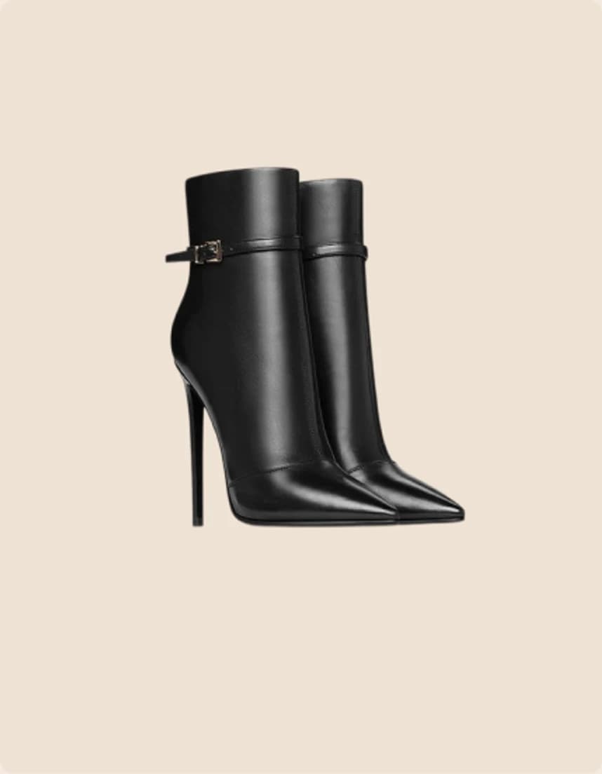 A black leather ankle boot on a needle heel