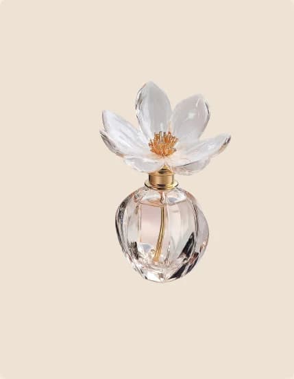 A round bottle under a crystal flower stopper