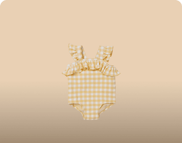 A baby bottle with a yellow collar